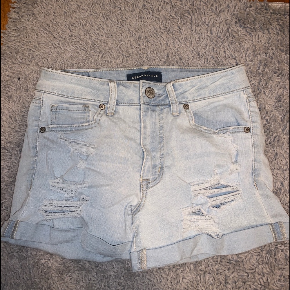 Light Blue ripped jean shorts